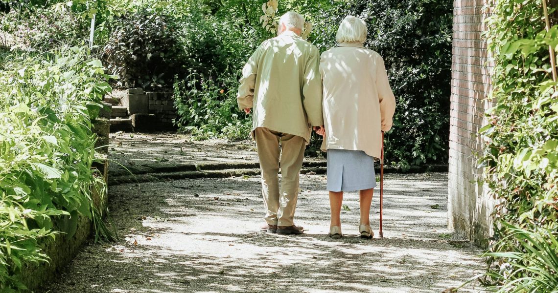 Older couple taking a walk